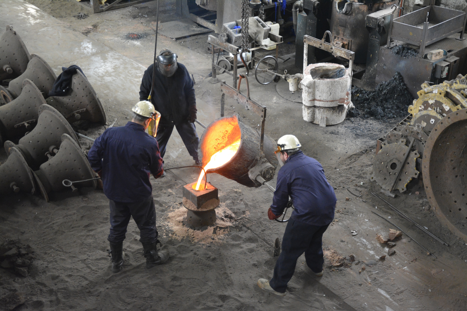 Bell metal being poured into the mould