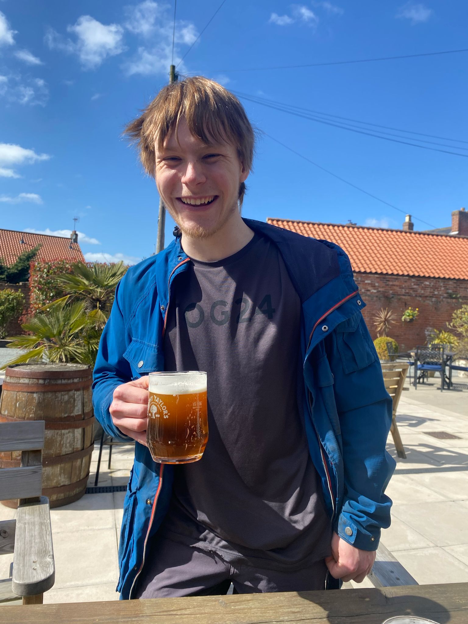 Mark celebrating his first peal with a pint