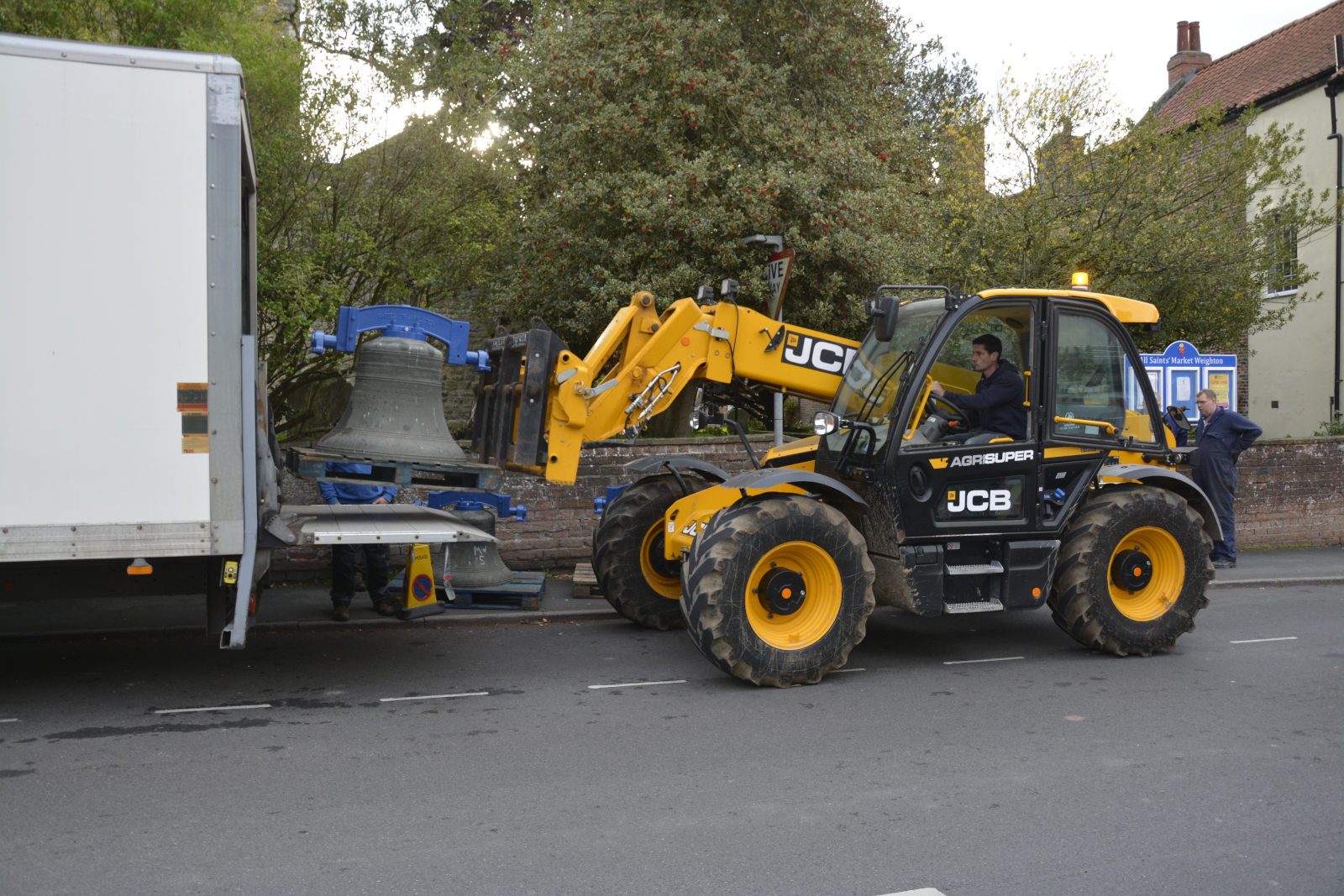 Getting the bells off the lorry.